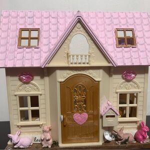 Pink and Cream Dollhouse with calico Figurines